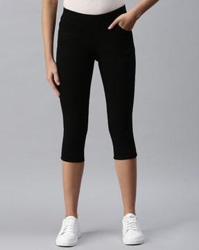 light-wash mid-calf length jeggings