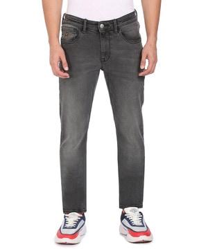 light-wash mid-rise slim tapered jeans