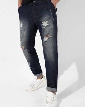 light-washed distressed relaxed fit jeans