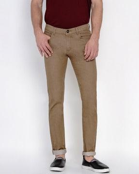 light-washed slim jeans with 5-pocket styling