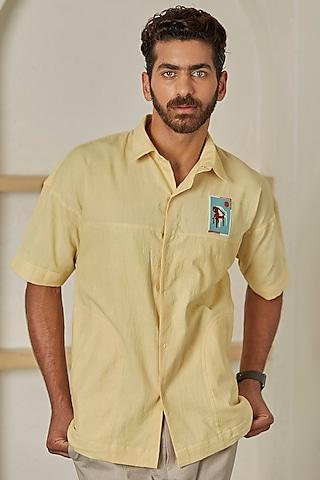 light yellow embroidered shirt