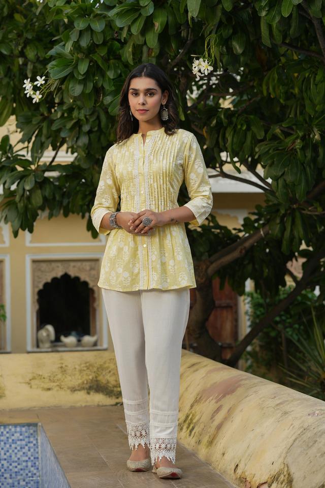 light yellow ethnic motif pure cotton tunic with lace work