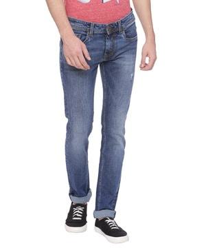lightly distressed slim jeans