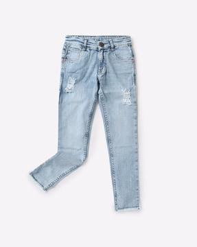 lightly washed & distressed mid-rise jeans
