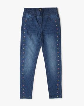 lightly washed embroidered jeans