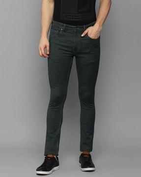 lightly washed low rise jeans