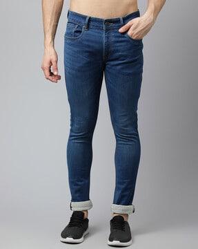 lightly washed mid-rise jeans