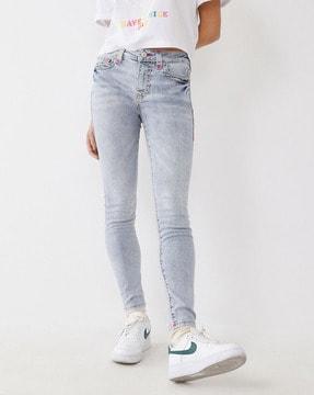 lightly washed skinny jeans
