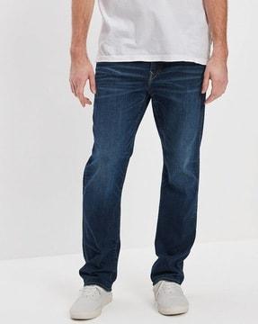 lightly washed whiskers relaxed jeans