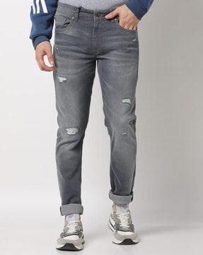 lightly distressed heavy-wash jeans
