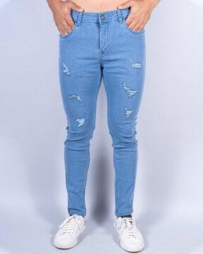 lightly-distressed skinny jeans