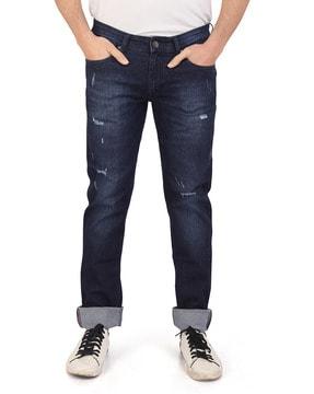 lightly distressed slim fit jeans