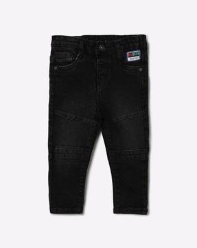 lightly-washed panelled jeans