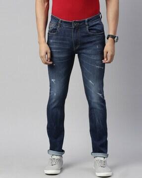 lightly-washed slim jeans with 5-pocket styling