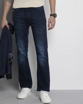 lightly washed & distressed bootcut jeans