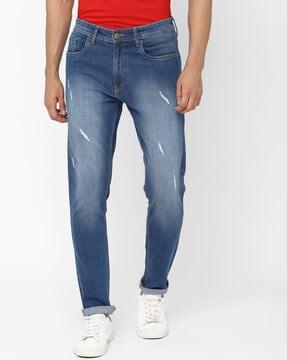 lightly washed & distressed slim fit jeans