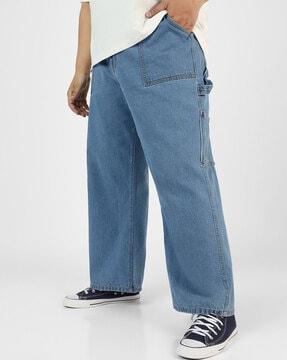 lightly washed baggy fit jeans with insert pockets