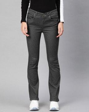 lightly washed bootcut jeans with insert pockets