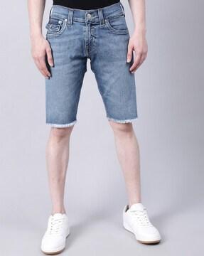 lightly-washed denim shorts