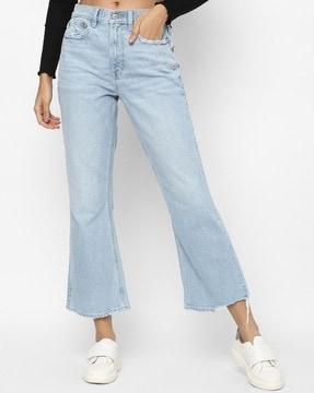 lightly washed distress flared jeans