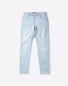 lightly washed distressed jeans