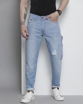 lightly washed distressed jeans