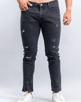 lightly washed distressed relaxed fit jeans