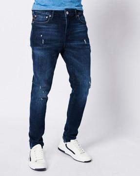 lightly washed distressed skinny fit jeans