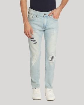 lightly washed distressed skinny fit jeans