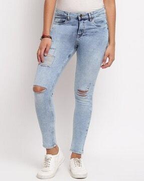 lightly washed distressed skinny fit jeans