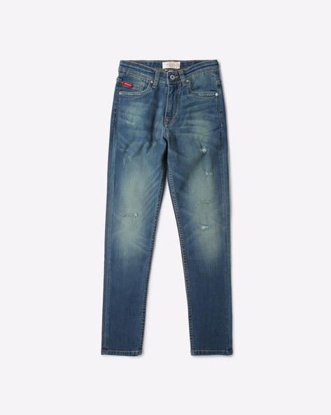 lightly washed distressed slim fit jeans