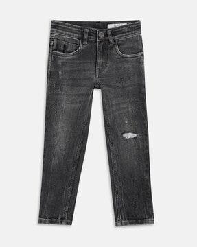 lightly washed distressed slim fit jeans