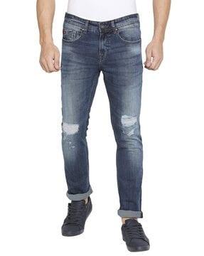 lightly washed distressed straight fit jeans