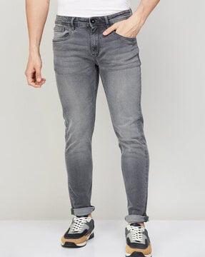 lightly washed jeans with 5-pocket styling