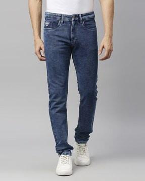 lightly washed jeans with 5-pocket styling