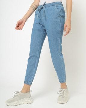 lightly washed jogger jeans with drawstring waist