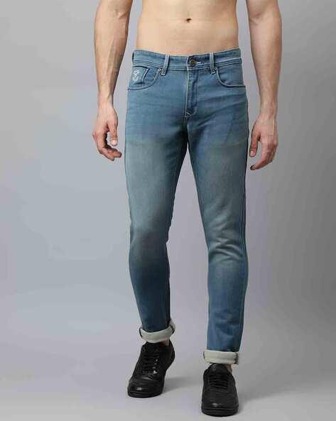 lightly washed low-rise jeans