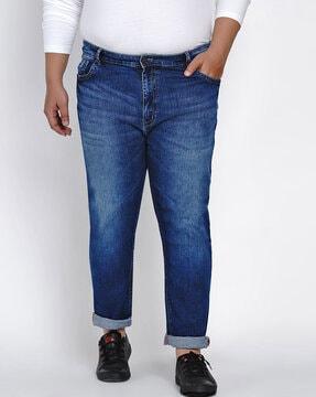 lightly washed mid-rise jeans with insert pockets