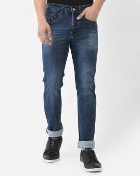 lightly washed mid-rise slim jeans