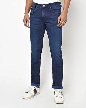 lightly-washed relaxed fit jeans