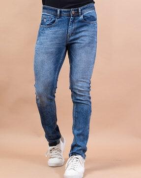 lightly washed relaxed fit jeans