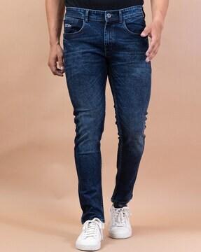 lightly washed relaxed fit jeans