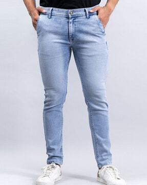 lightly washed relaxed fit jeans