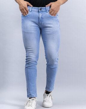 lightly washed relaxed fit jeans