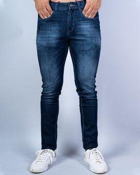 lightly washed relaxed fit jeans