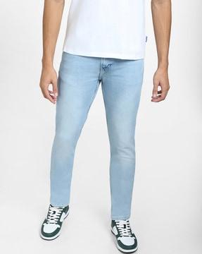 lightly-washed skinny fit jeans