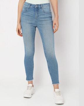 lightly-washed skinny fit jeans