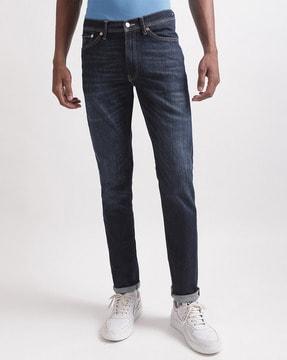 lightly-washed skinny fit jeans