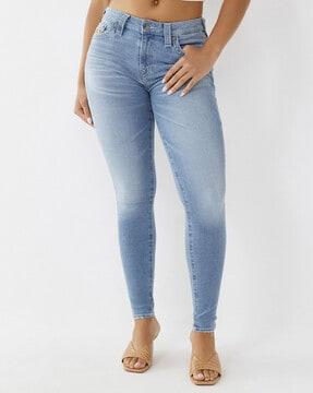 lightly washed skinny jeans