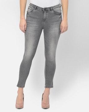 lightly-washed skinny jeans